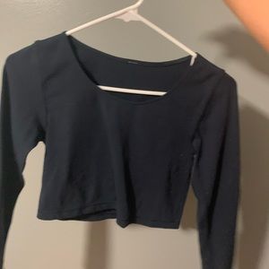 Dark blue cropped long sleave lululemon shirt.